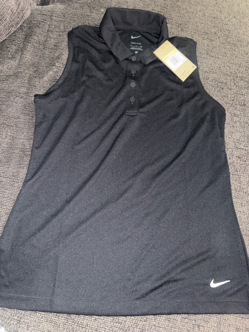 Nike Women’s Black Sleeveless Polo Tank with White Swoosh